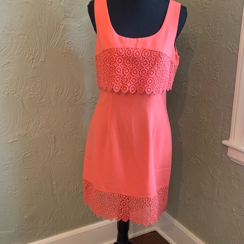 Coral size medium. New with tags attached. From a nonsmoking home.